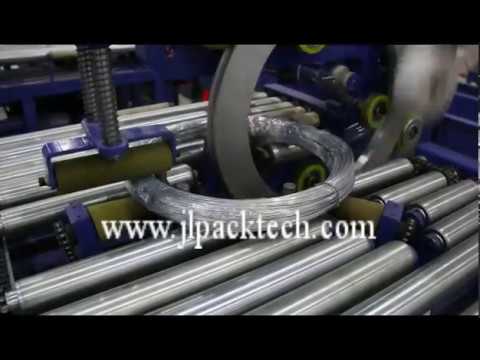 Horizontal wire coil packing machine by Shanghai Jinglin Packaging Machinery