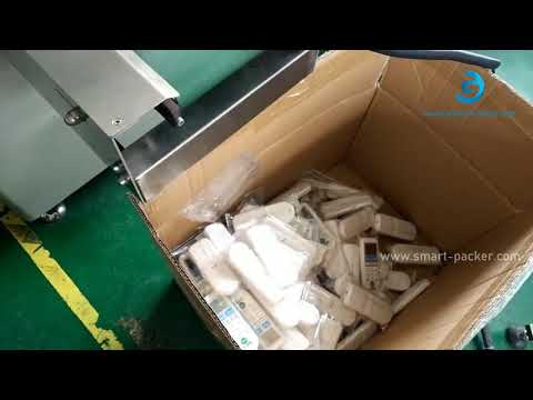 Romote control manual loading horizontal flow type bag filling sealing wrapper line