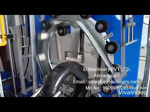 vertical coil tyre wrapping machine with roll mounting outer side #tyre #steelcoil #slitcoil #wire