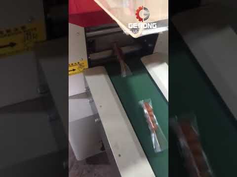 Automatic candy stick horizontal film wrapping bag packaging machine