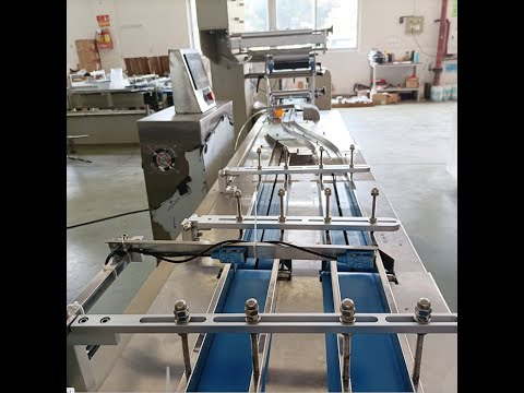 An automatic biscuit feeding packing machine, works well in the customer&#039;s warehouse now