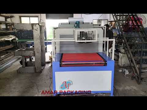 Fully Automatic Box Collecting Group Shrink Wrapping machine | Amar Packaging | Manufacturer