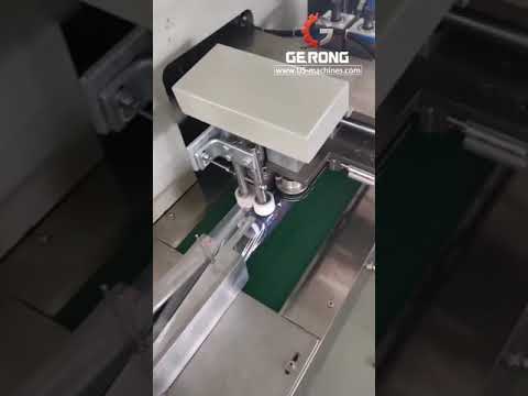 Automatic string coil roll horizontal film wrapping flow bag packaging machine