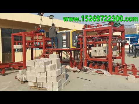 Test run block and pallet seperate machine plant , automatic concrete block packing machine