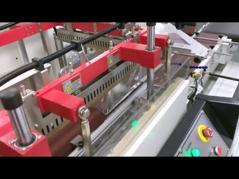 vertical type sealing cutting film shrinking machine for metal cans | آلة تقلص ختم العلب