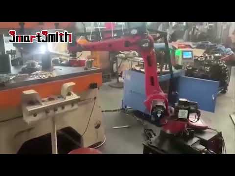 Automatic stamping by low cost industrial robot