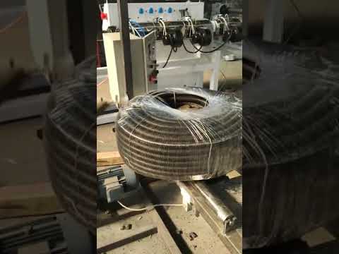 Wrapping machine for corrugated pipe