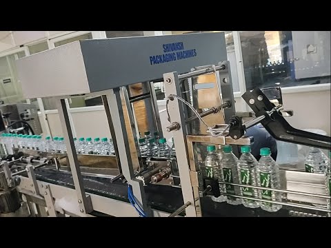 MINERAL WATER BOTTLE FULLY AUTOMATIC SHRINK WRAPPING MACHINE WITH AUTO SERVO LANE DRIVER 500ML