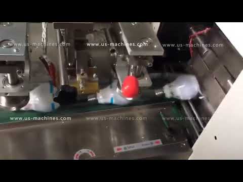 Automatic light bulb horizontal type film wrapping bagging machine