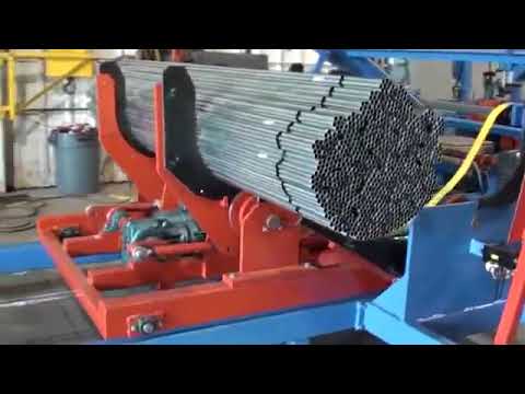 Steel tube bundle tapping and rod bundle packing machine