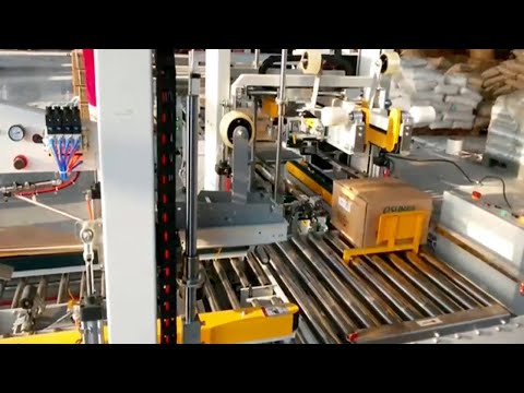 H type carton sealing machine with nylon bands strapping equipment Kartonverschließmaschine