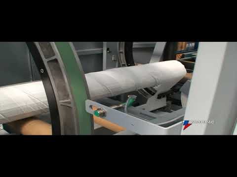 Want to wrap with paper and fix with tape? Watch the Robopac Spiror horizontal stretch wrapper