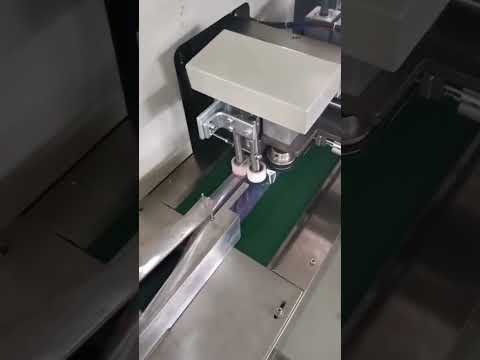 Automatic string coil roll horizontal film wrapping flow bag packaging machine