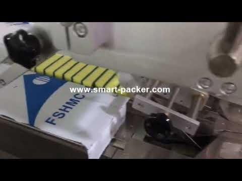 Washing sponge flow type pillow bag horizontal film wrapping bag packaging machine