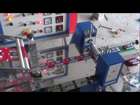 Horizontal flow wrapping machine