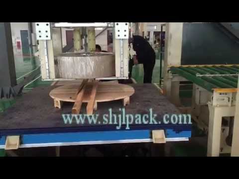 The steel coil packing system with palletizing and stacking machine