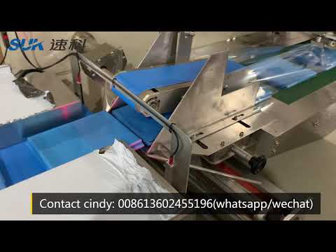 Horizontal protective suit flow packaging wrapping machine