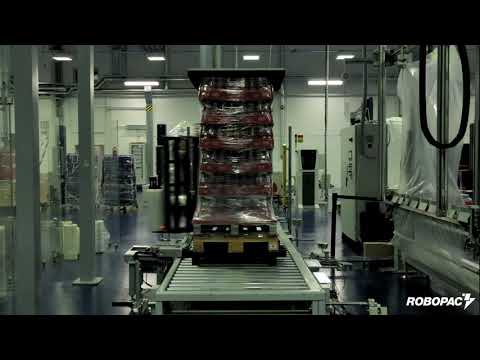 Helix Max TI automatic stretch wrapper with top sheet wrapping beverages on half pallets - Robopac