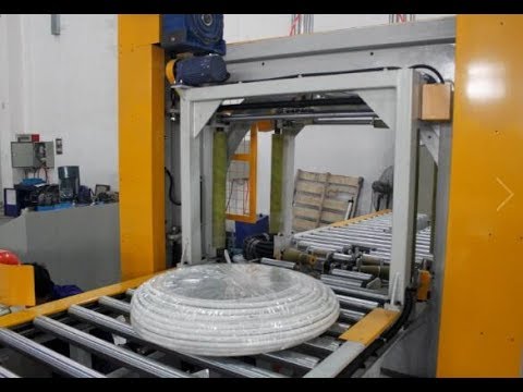 Automatic reel and pipe packing machine