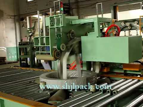 Coil packing line by film and paper