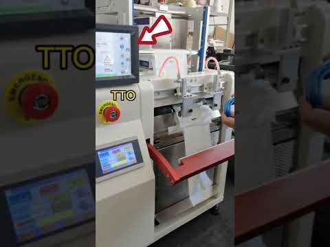 Auto bag packing,package automation,auto bagger,PE bag,packing machine