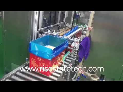 Automatic filling and packaging production line for margarine and shortening.