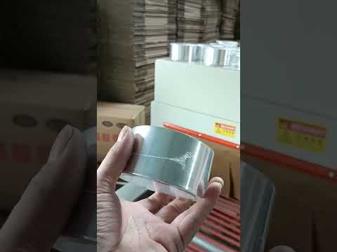 Automatic shrink wrapping packing machine