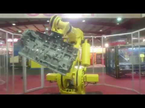 Awesome industrial robots - Fanuc robotic arms in action.