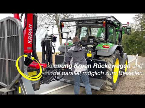 John Deere 6120R mit Krpan Rückewagen und Seilwinde parallel nutzbar zum Beiziehen