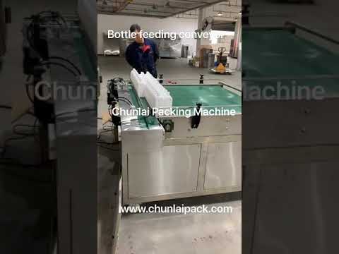 Conveyor feeding table connect with bottle filling line