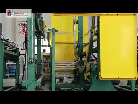 Giant horizontal orbital stretch wrapping machine with film covering unit