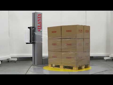 Low profile pallet wrapping machine