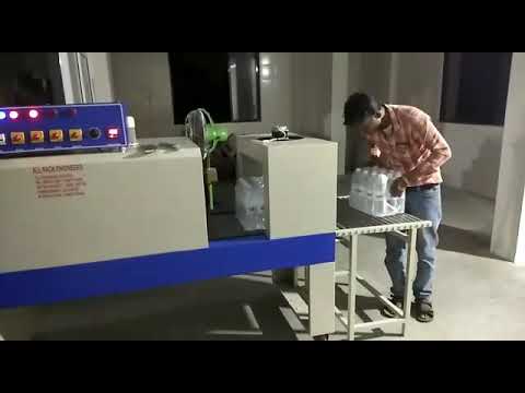 Automatic Shrink Wrapping (Group packing) Machine.