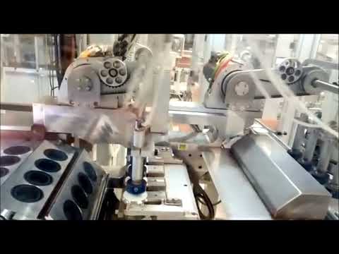 Coffee pods handling on manufacturing machine by Vuototecnica Bernoulli Effect Cups BEC