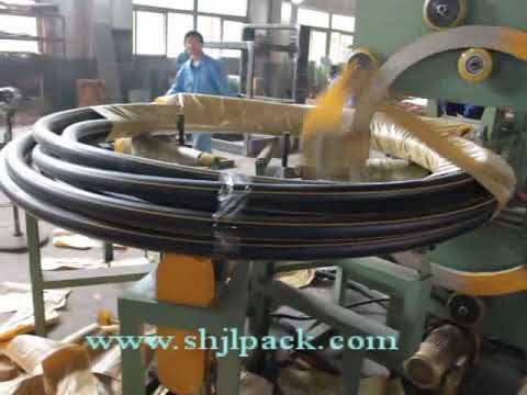 Horizontal coil wrapping machine