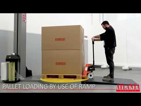 Pallet wrapping machine with ramp