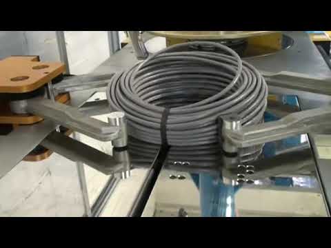 Automatic cable winding and strapping Machine