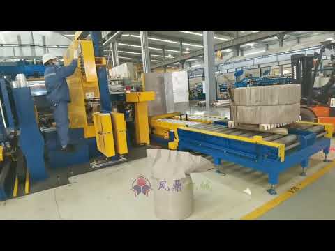 Automatic coil wrapping machine with 90 degree coil upender at the coil packing line