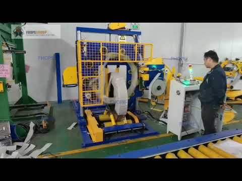 Steel coil paper and film wrapping machine