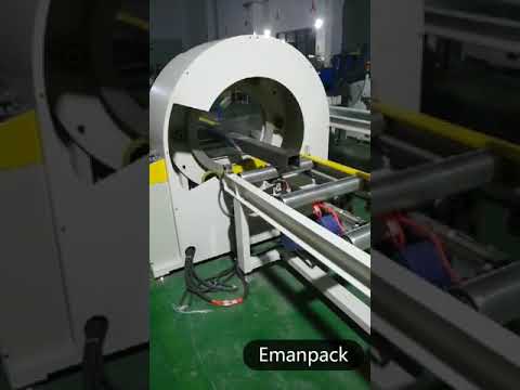 Orbital wrapping machine packing heavy bundles of steel tube