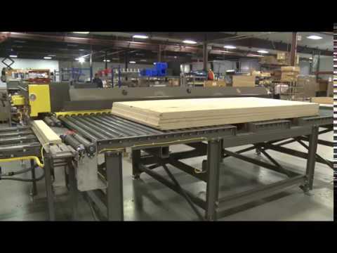 Horizontal board wrapping and banding machinery.