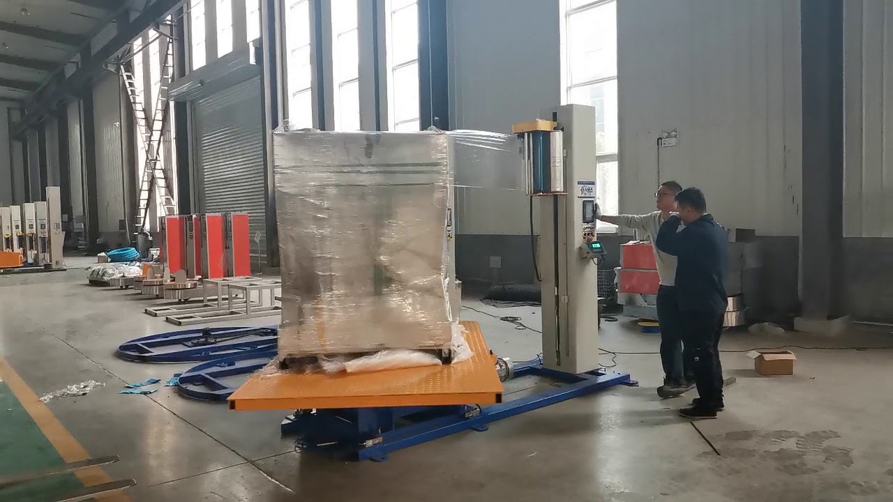 Rotating wrapping device for pallets. - Wrapping Machine